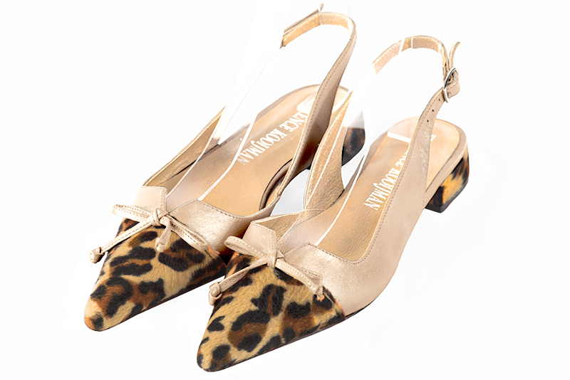 Safari black and gold women's open back shoes, with a knot. Pointed toe. Flat flare heels. Front view - Florence KOOIJMAN